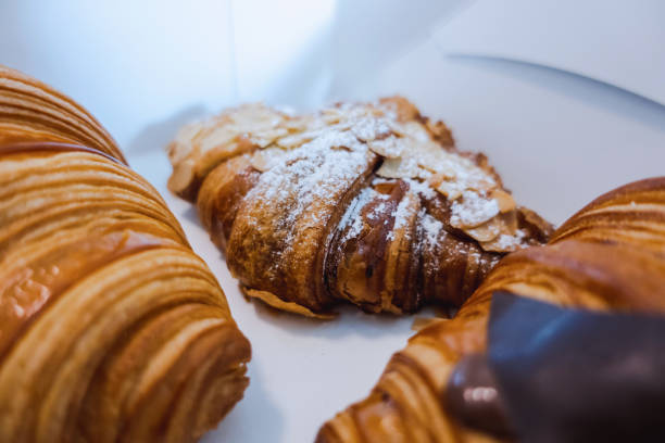 istock Croissant set in a paper box looks appetizing 1372150604
