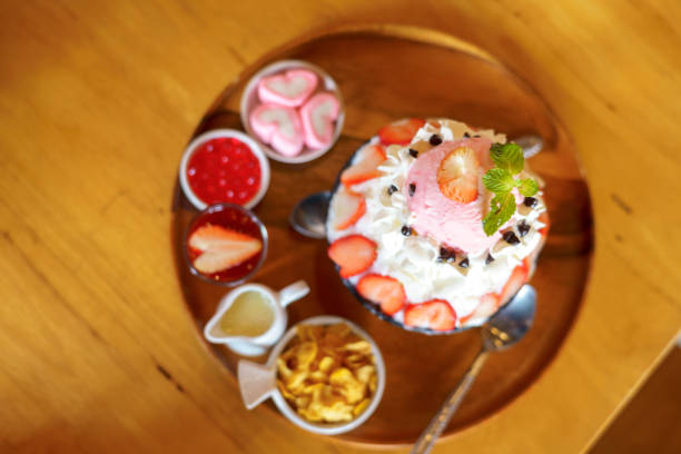 istock Strawberry bingsu placed on a wooden table 1372152258