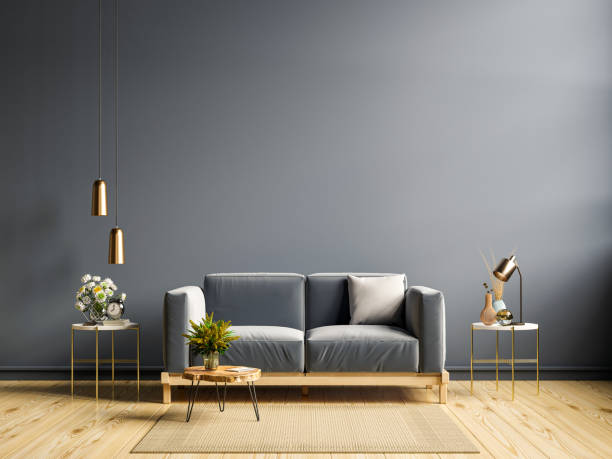 istock Empty living room with sofa,lamp and table on empty dark blue wall background. 1372153591