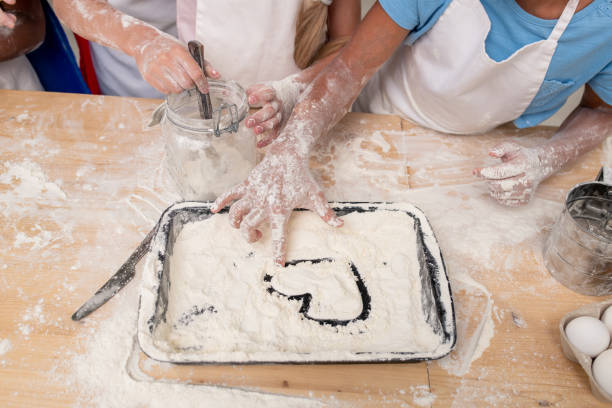 istock Teaching Little Daughter to Cook 1372153822