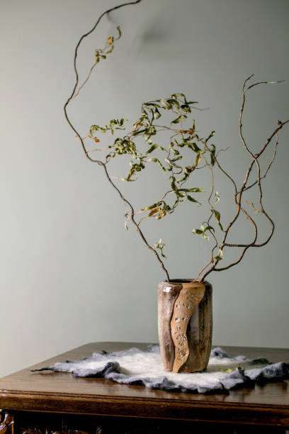 istock Home interior with beige handcrafted ceramic vase 1372156715