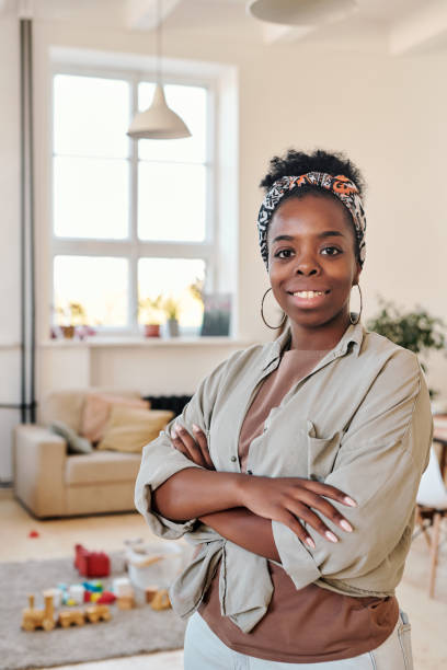 istock Positive young mother at home 1372158874