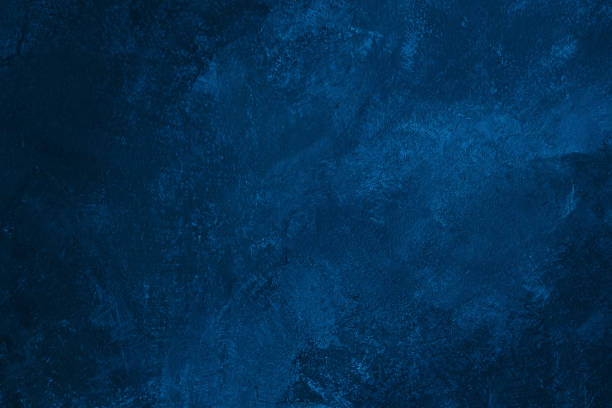istock Dark blue colored abstract textured background. Decorative plaster on the wall. 1372160675