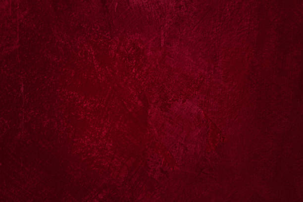 istock Burgundy colored abstract textured background. Decorative plaster on the wall. 1372160680