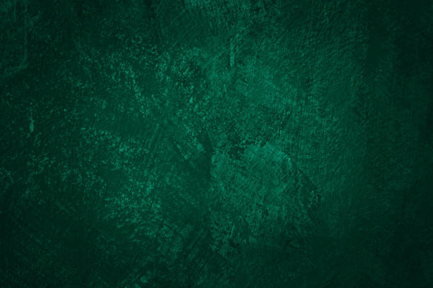 istock Dark green colored abstract textured background. Decorative plaster on the wall. 1372160681
