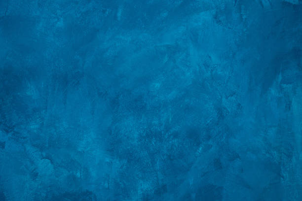 istock Blue colored abstract textured background. Decorative plaster on the wall. 1372160686