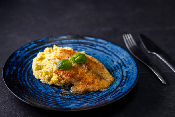 istock spicy fillet of white cod with couscous 1372161850