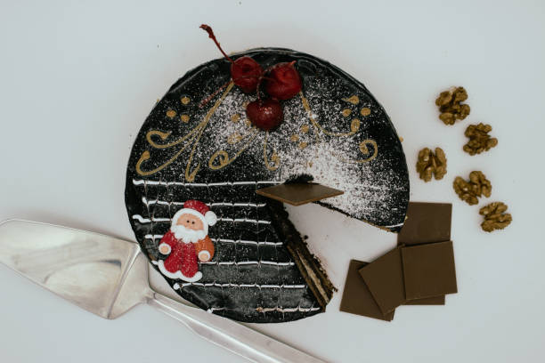 istock Delicious chocolate cake with Santa 1372164424