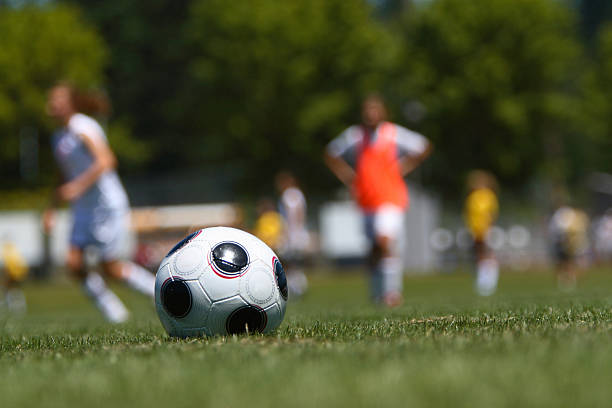 istock Soccer ball on the field 137216644