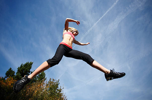 istock Young sporty woman jumping 137216751