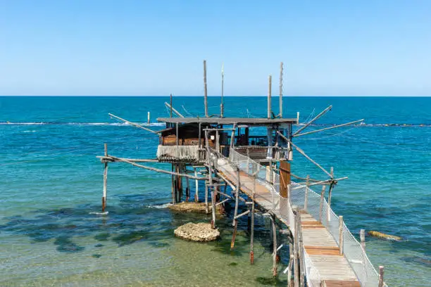 traditional fishing equipment called Trabocco at seaside, Adriatic sea