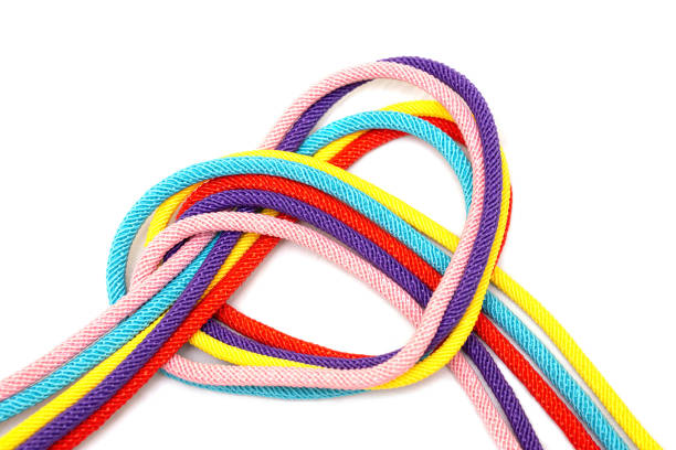 istock Heart shape made of five multicolored cords on white 1372169071