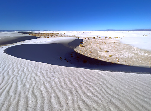 145,762 acres in the Tularosa Basin, white sand dunes composed of gypsum crystals