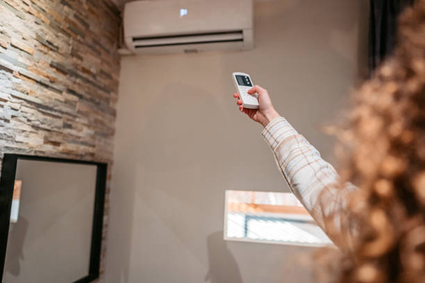 istock Turning On The Air Conditioner 1372177735