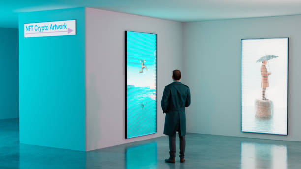 istock Man looks at NFT crypto artwork  in an art museum 1372178896