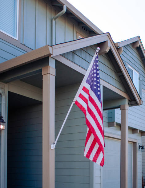 istock American Flag Outside Residential Building 1372181787
