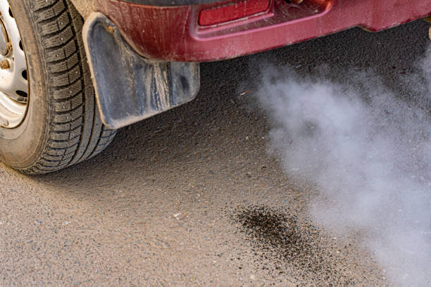 istock smoke from the car exhaust pipe 1372183506
