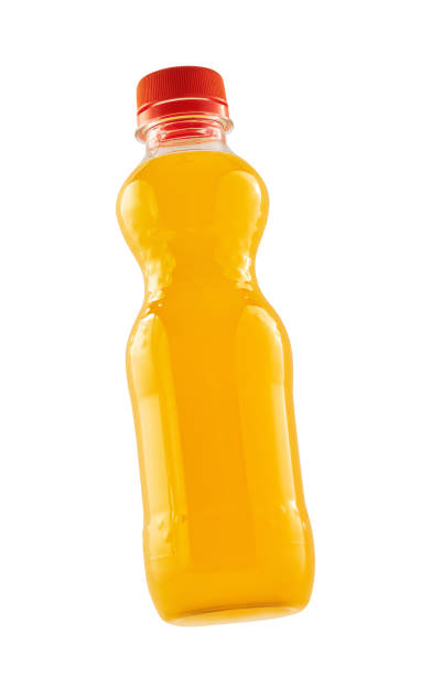 istock Orange fizzy drink in a plastic bottle isolated 1372184283