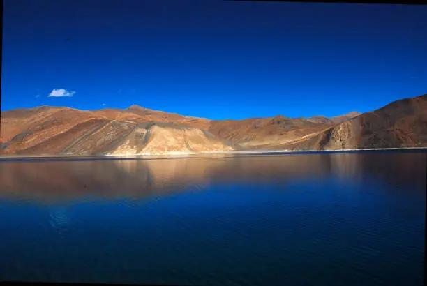 Pangong Tso or Pangong Lake is an endorheic lake spanning eastern Ladakh and West Tibet situated at an elevation of 4,225 m. It is 134 km long and divided into five sublakes, called Pangong Tso, Tso Nyak, Rum Tso and Nyak Tso.