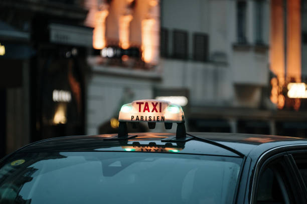 istock Paris taxi at night 1372184439