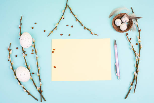 istock Easter holiday and spring background, empty paper for text, pastel colors, nest with eggs, pussy willow, greeting card 1372184594