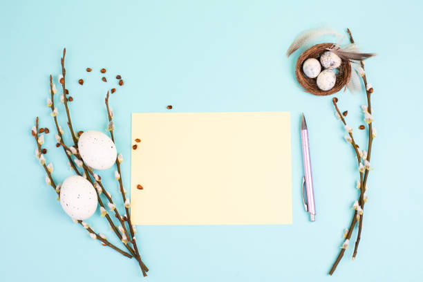 istock Easter holiday and spring background, empty paper for text, pastel colors, nest with eggs, pussy willow, greeting card 1372184617