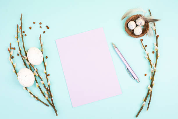 istock Easter holiday and spring background, empty paper for text, pastel colors, nest with eggs, pussy willow, greeting card 1372184628