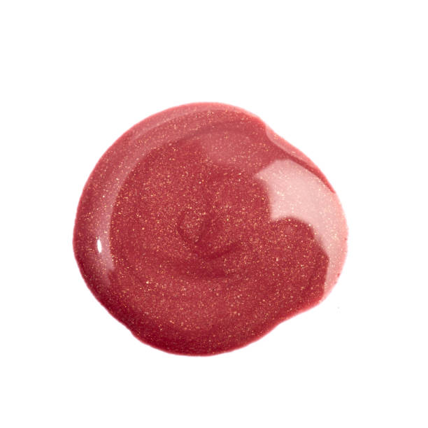 istock Lipstick swatch isolated on white background. Red lip gloss swipe 1372186279