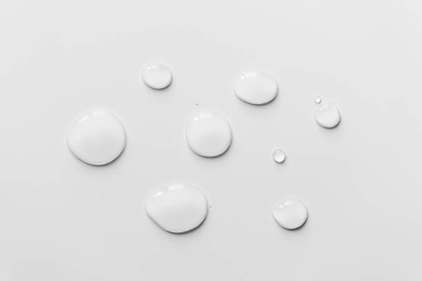 istock Water drops on white background, top view 1372186293