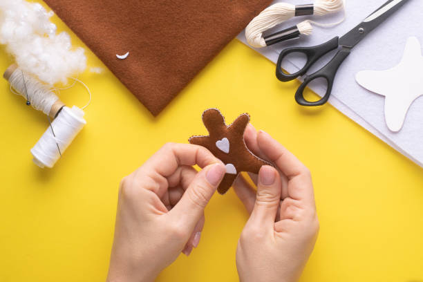 istock Glue the hearts to the Christmas gingerbread man. Step-by-step manufacturing instructions. Step 8. 1372187067