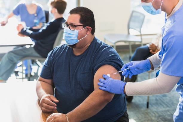 istock Adult patient gets vaccine 1372188446