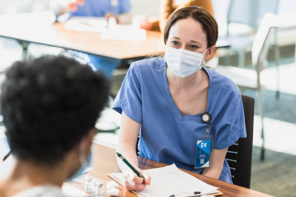 Nurse listens to the patient