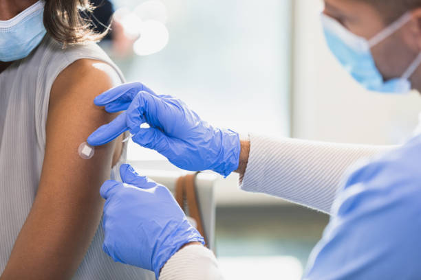 istock Doctor places bandage 1372188505