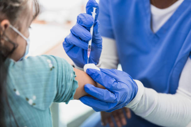 istock Nurse injects the patient 1372188510