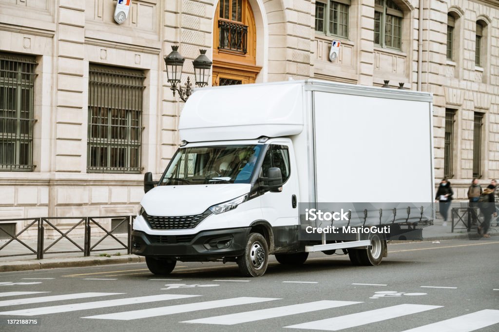 Delivery truck in a city Delivery truck in a city street Truck Stock Photo