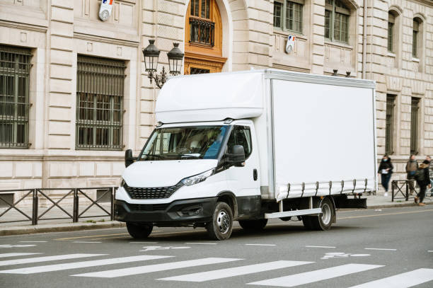 Delivery truck in a city stock photo