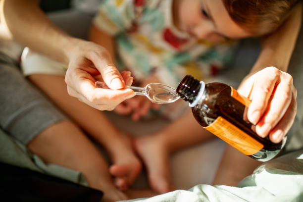 istock Mother taking care of sick child 1372189612