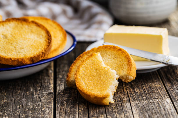 Dietary rusks bread. Crusty biscuits. Dietary rusks bread. Crusty biscuits on wooden table. zwieback toast stock pictures, royalty-free photos & images