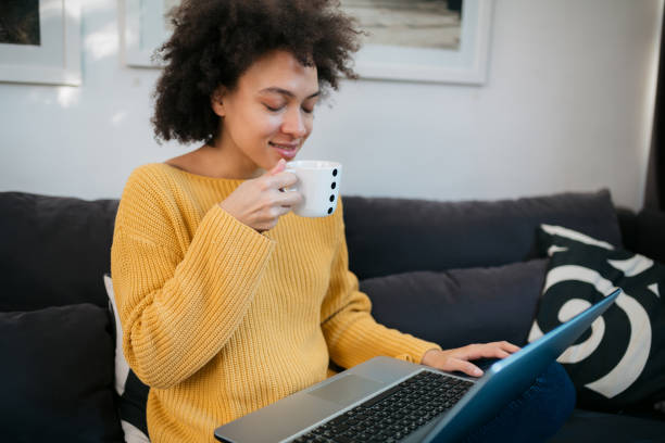 istock Happy African American female freelancer working from home 1372194498