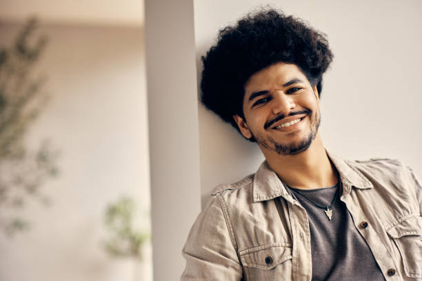 istock Portrait of young happy Middle Eastern man looking at camera. 1372200160