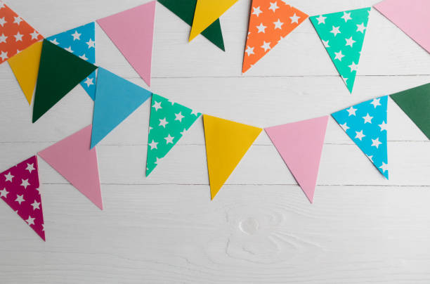 istock Colorful paper flags on a white background with space for text. Layout, template. 1372200496