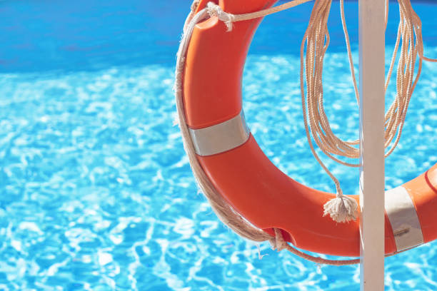 istock Lifebuoy near the swimming pool. 1372200536