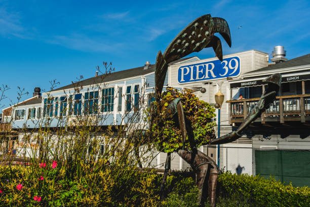 San Francisco, USA - May 13, 2011. Crossover walkway from a parking garage to Pier 39. Pier 39 is a popular tourist attraction in San Francisco, with waterfront shops and restaurants built on an old pier and offering live street entertainment and cruise tours around the Bay.