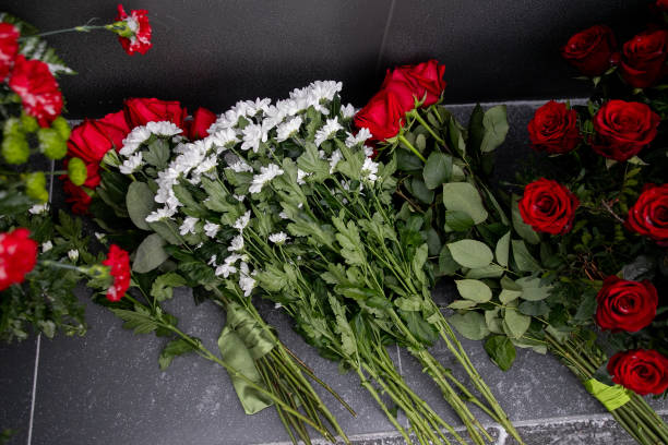 istock carnations at the memorial in honor of the second world war 1372206985