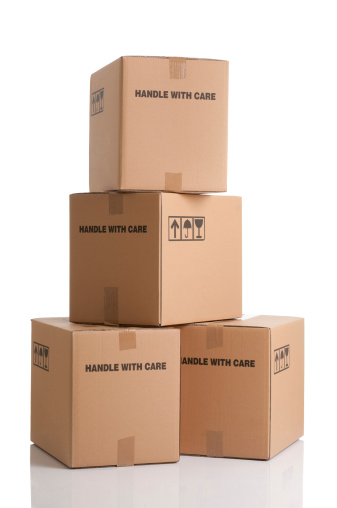 Pile of cardboard boxes ready to be shipped isolated on white background.
