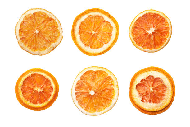 istock Dry orange slices isolated on white. 1372215604