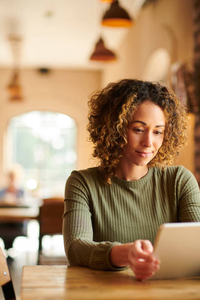 istock tablet in the coffee shop 1372222093
