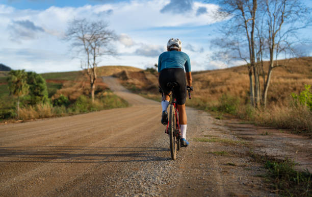 istock Cyclists practicing on gravel roads 1372223881