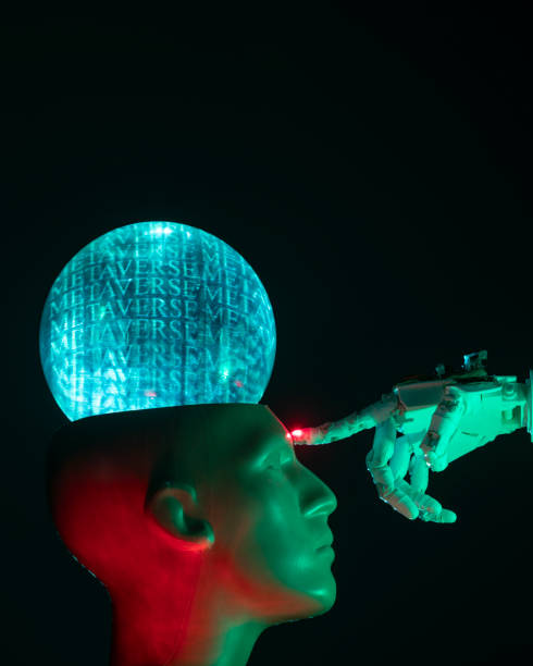 istock Humanoid robot hand touching cyborg shaped bust with brain text METAVERSE is written on, for machine learning 1372225150