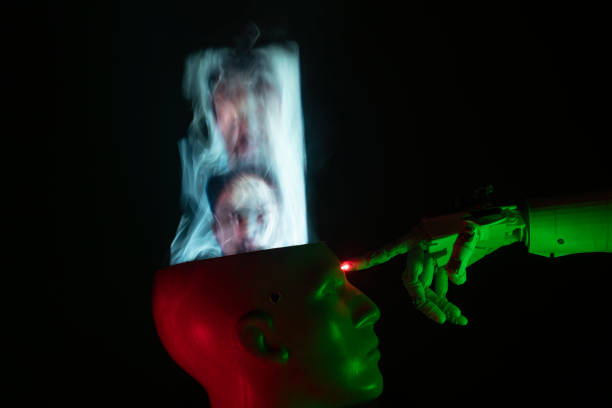 istock Humanoid robot hand aiming forefinger at cyborg shaped clay bust 1372226563